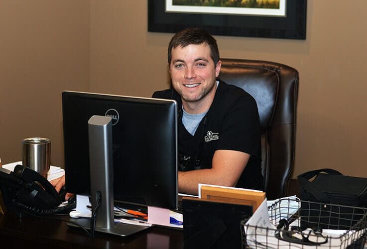 Dentist working in consultation room