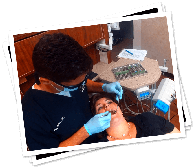 Dentist performing restorative dentistry treatment