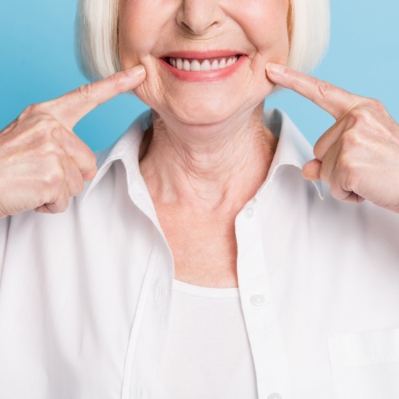 Dentures soaking in a glass