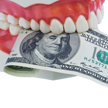 Dental mold biting $100 bill 