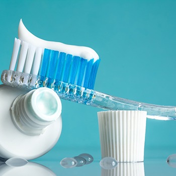 Close-up of a toothbrush and some toothpaste