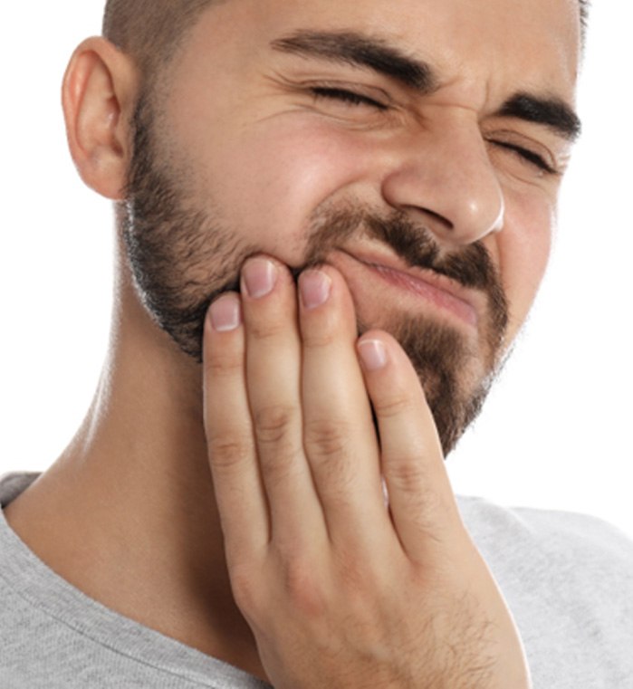 Man with tooth pain; dental emergency in Powdersville, SC