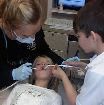Kids in the office during children's dentistry visit
