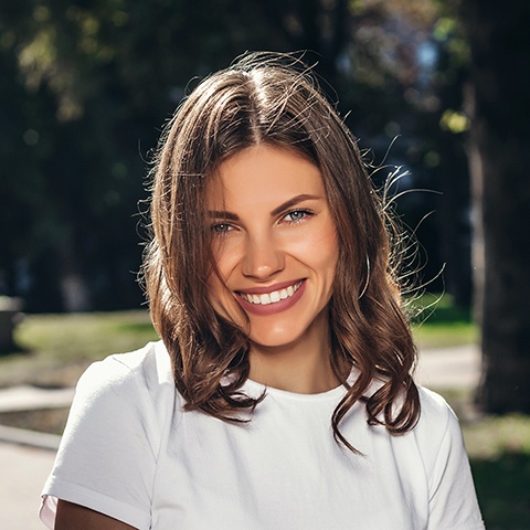 a patient showing off her smile
