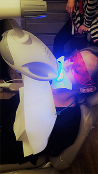 Patient receiving in-office teeth whitening in Simpsonville
