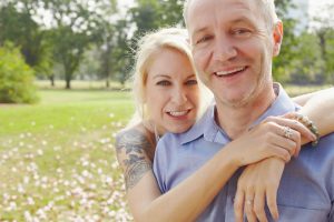 couple hugging at the park