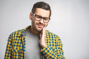 Man with tooth pain