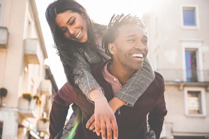 smiling man and woman on a date in Greenwood