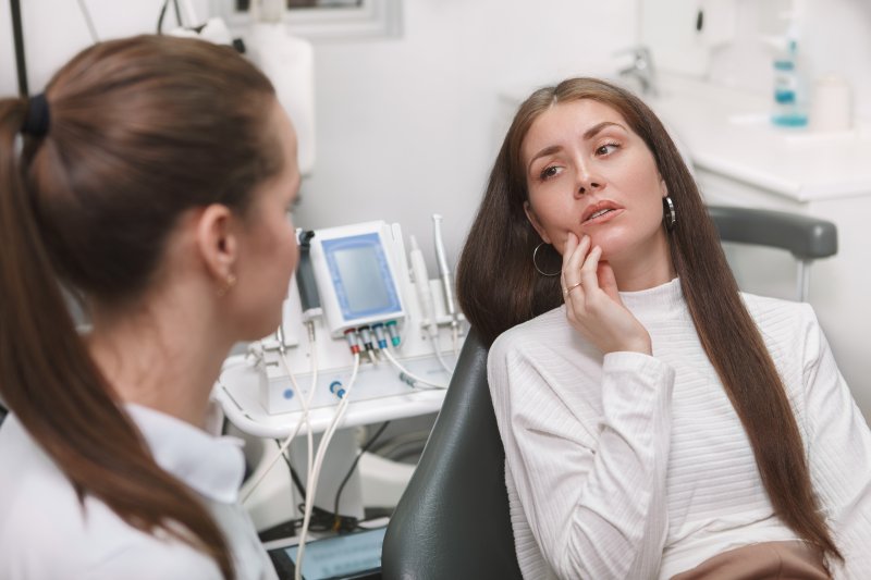 Woman at an emergency dental visit