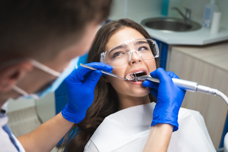 A patient receiving root canal therapy