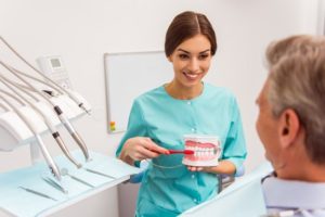 a patient receiving dentures 