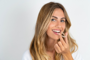 a person removing their ClearCorrect aligners